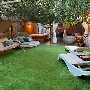 https://private-garden-house.gethaifahotels.com